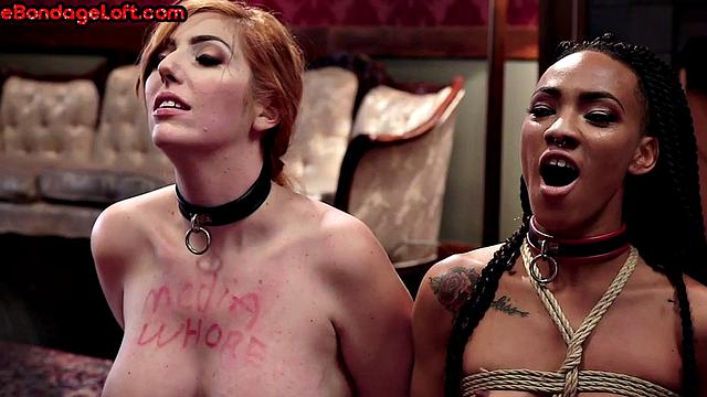 Whipped redhead takes cock from Ebony in BDSM 3some