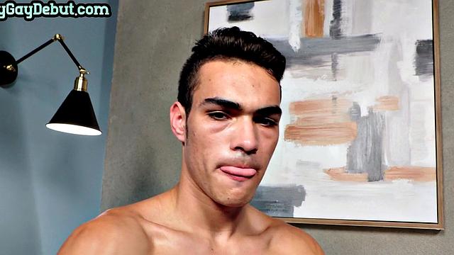 Handsome jock masturbating while fingering his ass