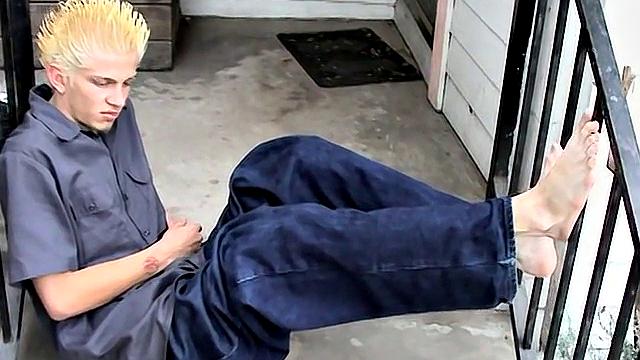 Ian Madrox kicks back outdoors and gives his feet more attention than his last boyfriend