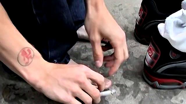 Ian Madrox kicks back outdoors and gives his feet more attention than his last boyfriend