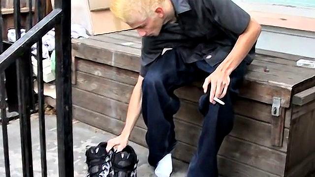 Ian Madrox kicks back outdoors and gives his feet more attention than his last boyfriend