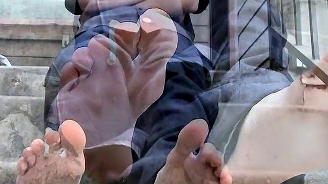 Ian Madrox kicks back outdoors and gives his feet more attention than his last boyfriend