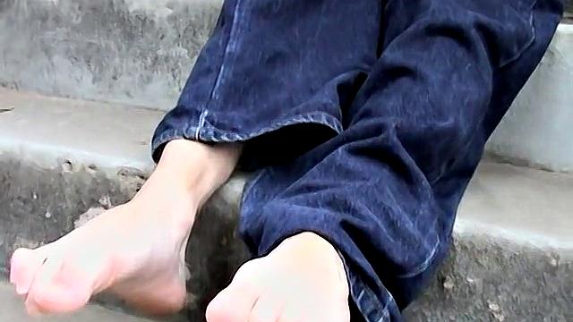 Ian Madrox kicks back outdoors and gives his feet more attention than his last boyfriend