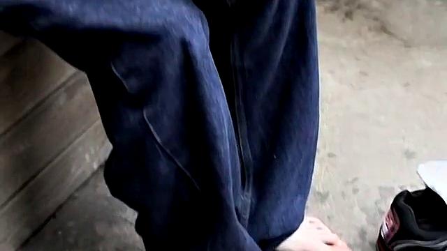 Ian Madrox kicks back outdoors and gives his feet more attention than his last boyfriend
