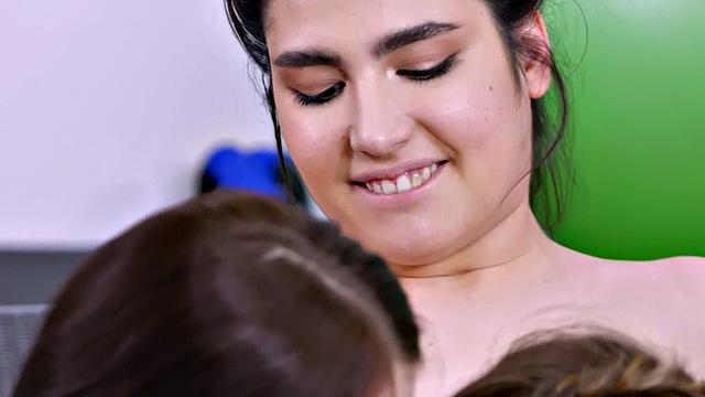 Gym lesbians pussylicking and fingering in erotic threesome