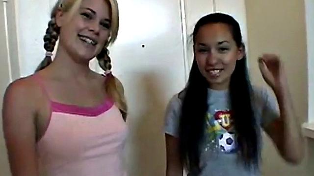 Hot brunette girlfriend gets fingered by her girlfriend in a topless affair