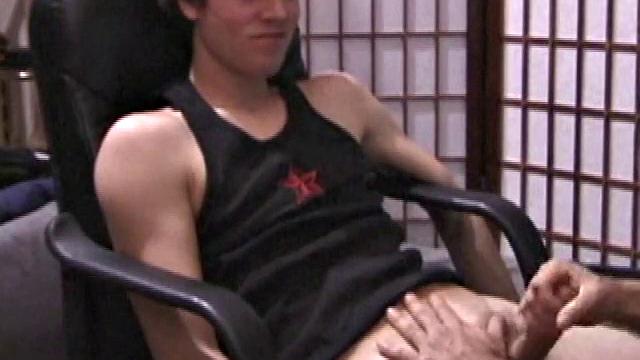 Kicking back in a chair, Jayden is ready to jack off again, and we get to watch! This time he enjoys some help from a mystery hand that edges out his cum.