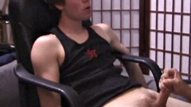 Kicking back in a chair, Jayden is ready to jack off again, and we get to watch! This time he enjoys some help from a mystery hand that edges out his cum.