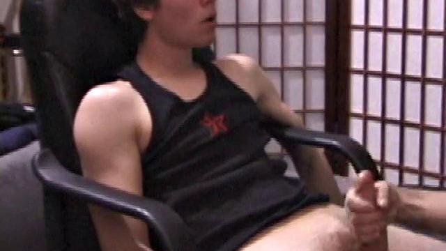 Kicking back in a chair, Jayden is ready to jack off again, and we get to watch! This time he enjoys some help from a mystery hand that edges out his cum.