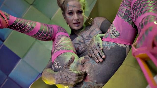 Heavily Tattooed Teen Stretching