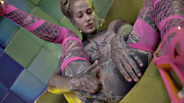 Heavily Tattooed Teen Stretching