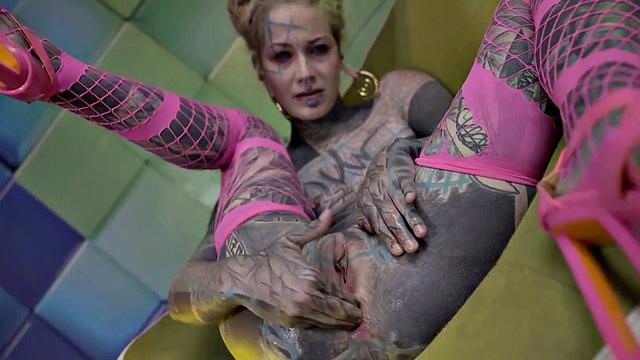 Heavily Tattooed Teen Stretching