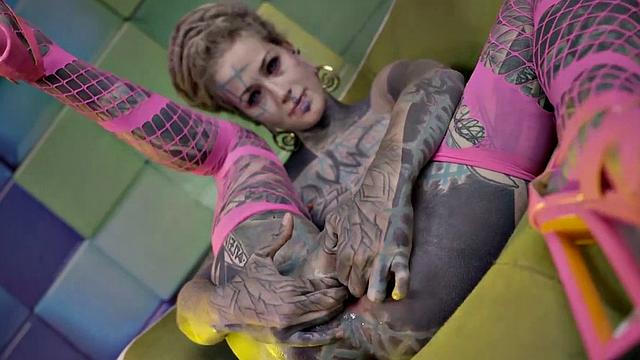 Heavily Tattooed Teen Stretching