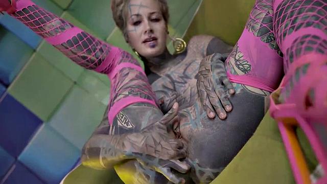 Heavily Tattooed Teen Stretching