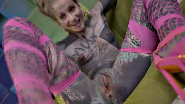 Heavily Tattooed Teen Stretching