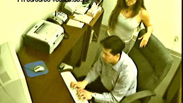 Seductive office worker strokes her boss under the desk and makes him cum during a risky work affair