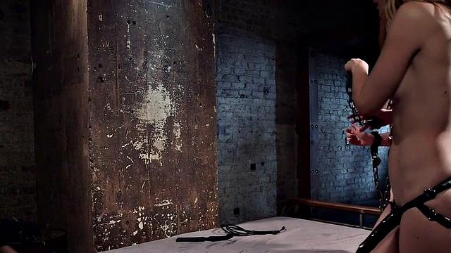 Latex lezdom MILF fucks sub with toy and hitachi