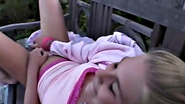 Petite blonde teen fingers her pussy