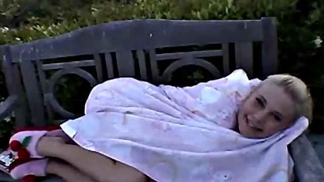 Petite blonde teen fingers her pussy