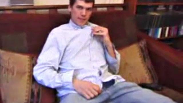 After hanging out with friends for the afternoon, Matthew finds himself on the couch with a raging boner and no one to help. So, he throws in a porn, sticks a hand down his pants and starts playing with himself.