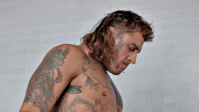 Dominant jock with tattoos barebacks businessman