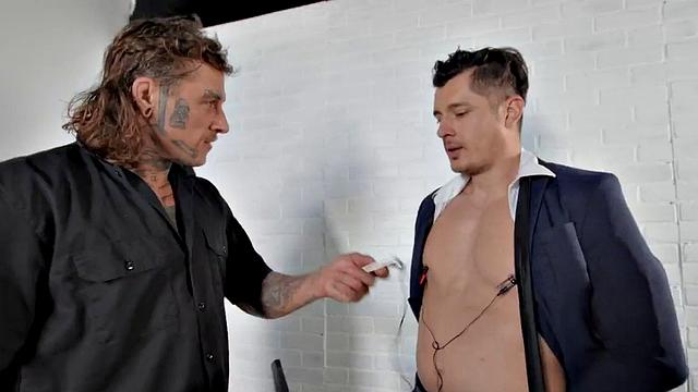 Dominant jock with tattoos barebacks businessman