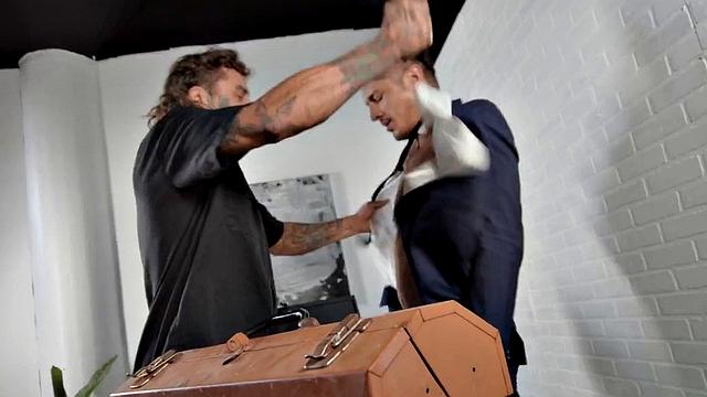 Dominant jock with tattoos barebacks businessman