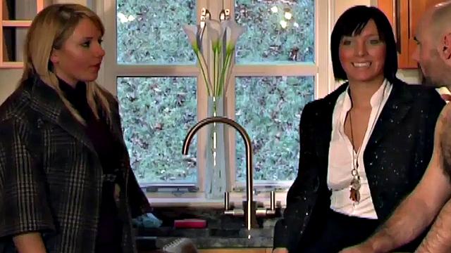 Blonde CFNM slut enjoys kissing and milking a lucky guy in the kitchen