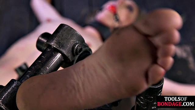 Mouthgagged girl gets flogging by master