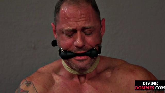 Mouthgagged male disciplined