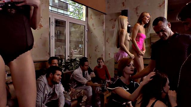 Latex slut deepthroats in public oral orgy for cums in mouth