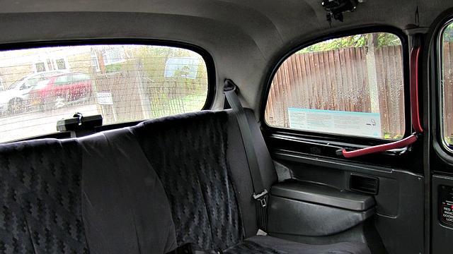 Tattooed brunette hops into cab for wild ride with big-titted partner