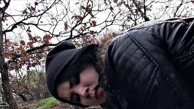 A emo chick get pounded hard in the woods while wearing glasses and earrings