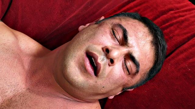 Crossdresser hunk enjoys footjob sex with his partner