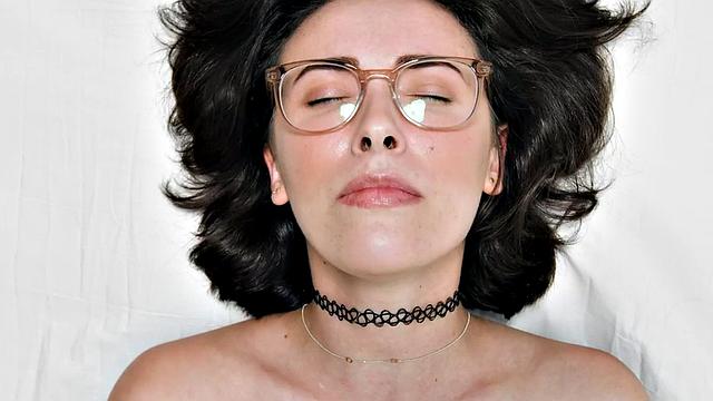 Cutie gently jerking pussy with fingers