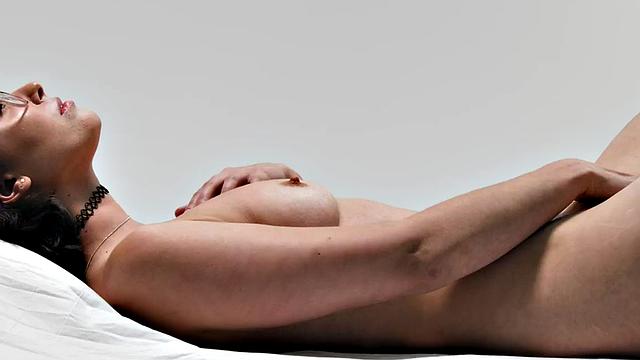 Cutie gently jerking pussy with fingers