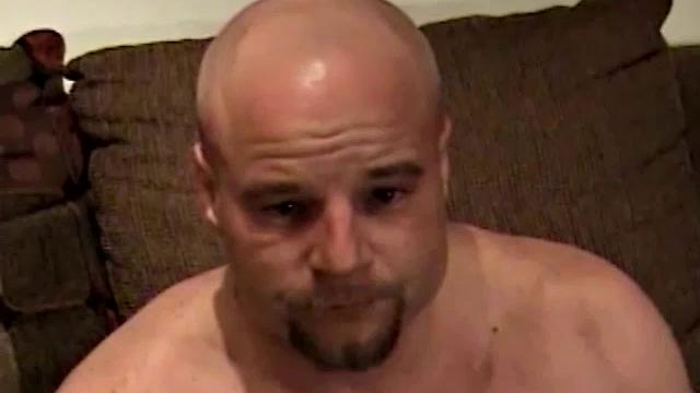 Shane is a big, cigar-smoking, hairy man, with a rough outdoors look. He works as a garbage man and is about to enter the Army. Enjoy as this muscular 28-year-old gets naked and strokes his hard cock.