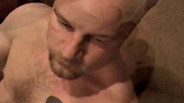 Shane is a big, cigar-smoking, hairy man, with a rough outdoors look. He works as a garbage man and is about to enter the Army. Enjoy as this muscular 28-year-old gets naked and strokes his hard cock.