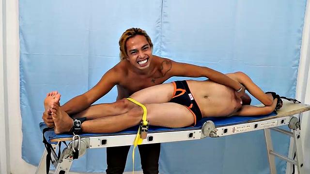 Introducing cute and ticklish Asian twink Jojo. This is his first shoot with Laughing Asians. Our long haired Asian boy Hunter is the sadistic tickler who has strapped Jojo on the tickle rack and puts him through his first tickle experience.