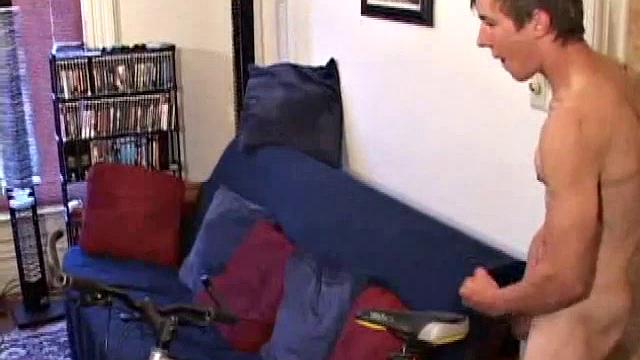 Returning from a ride on his bike Andrew Patterson starts a porn video and strips off his clothes. A little lube helps in the stroking department, and when he's ready Andrew pumps his warm cum load.