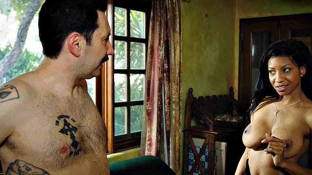 Inked ebony babe gets cumshot on her ass after cockriding