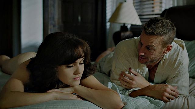 Inked ebony babe gets cumshot on her ass after cockriding