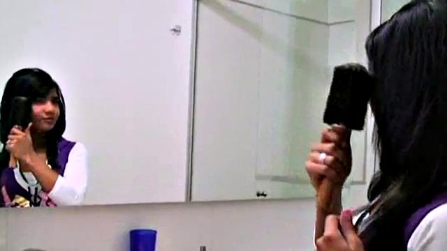 Amateur teen masturbates in a solo scene