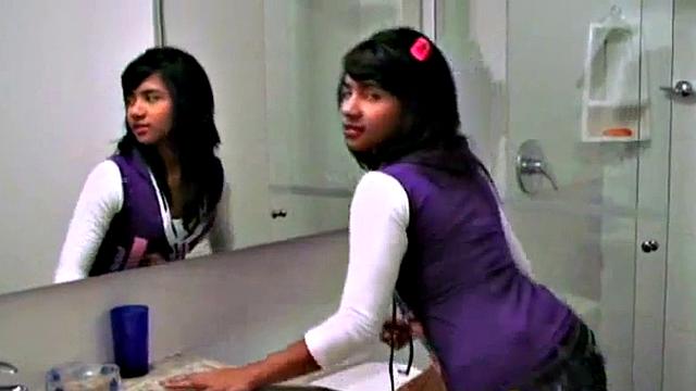 Amateur teen masturbates in a solo scene