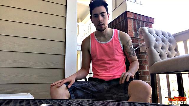 Our featured solo boy of the week is Cole Summers. Seated outside, he frequently looks over his shoulders as his stiff dick comes out and he begins stroking.