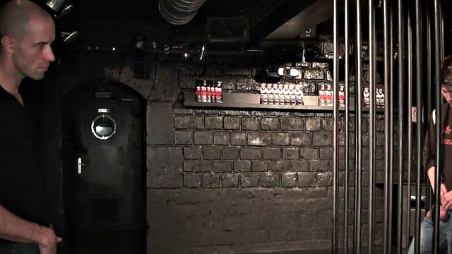 Amateur stud in cage fucks bottom in gay club after oral