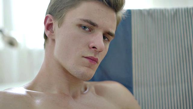 Thin athletic twink wanking big cock in session