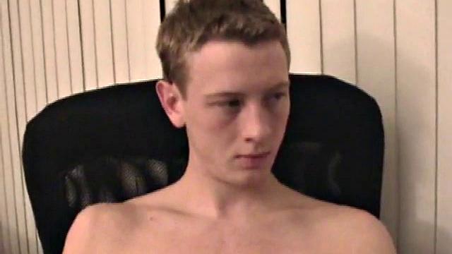 Young Corbin is back and this time, he's at his computer working a growing bulge inside his sweats. When he tugs down the sweats, we see his boner.