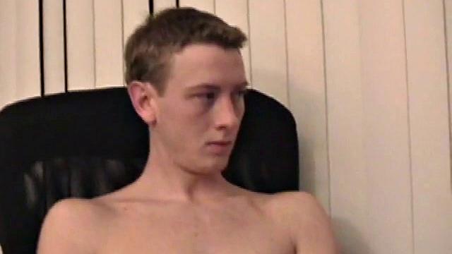 Young Corbin is back and this time, he's at his computer working a growing bulge inside his sweats. When he tugs down the sweats, we see his boner.