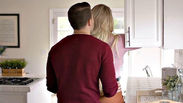 Big-titted stepmom riding stepson in the kitchen